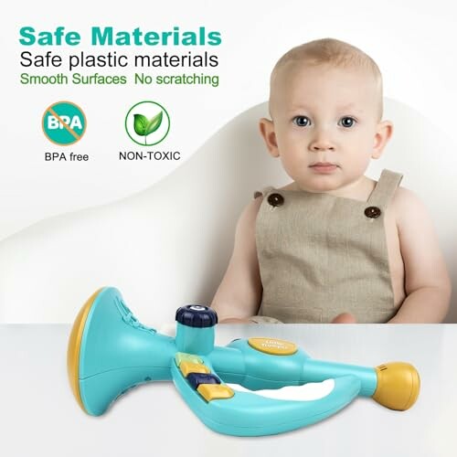 Baby sitting with a toy stethoscope, labeled as BPA free and non-toxic.