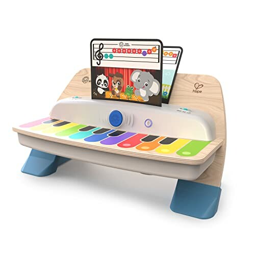 Colorful children's toy piano with a digital screen and animal graphics.