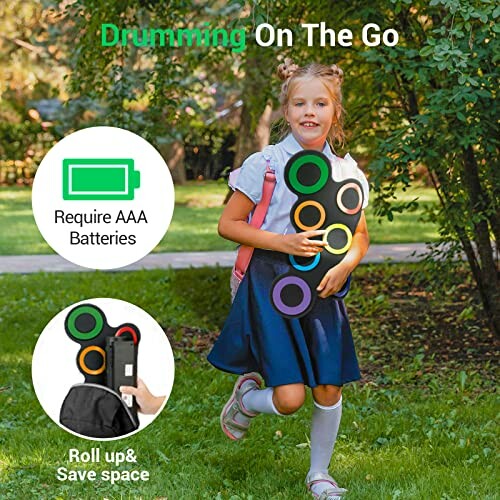 Girl holding portable drum kit with text 'Drumming On The Go'.