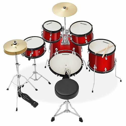 Red drum set with cymbals and stool