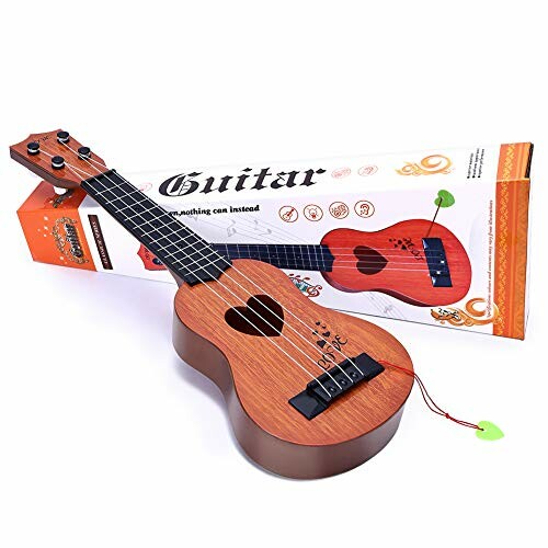 Toy ukulele with packaging box displaying guitar text.