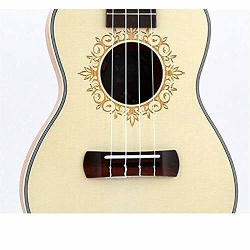 Close-up of a ukulele body with decorative sound hole.