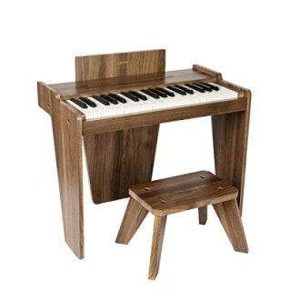 Wooden toy piano with matching bench.
